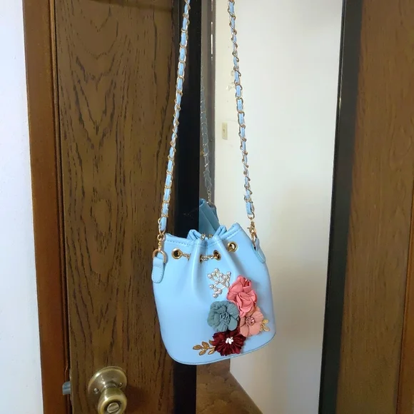 Blue Floral Faux Leather Bucket Bag with Brass Details - Picture 2 of 6